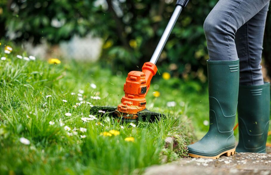 person mowing the lawn