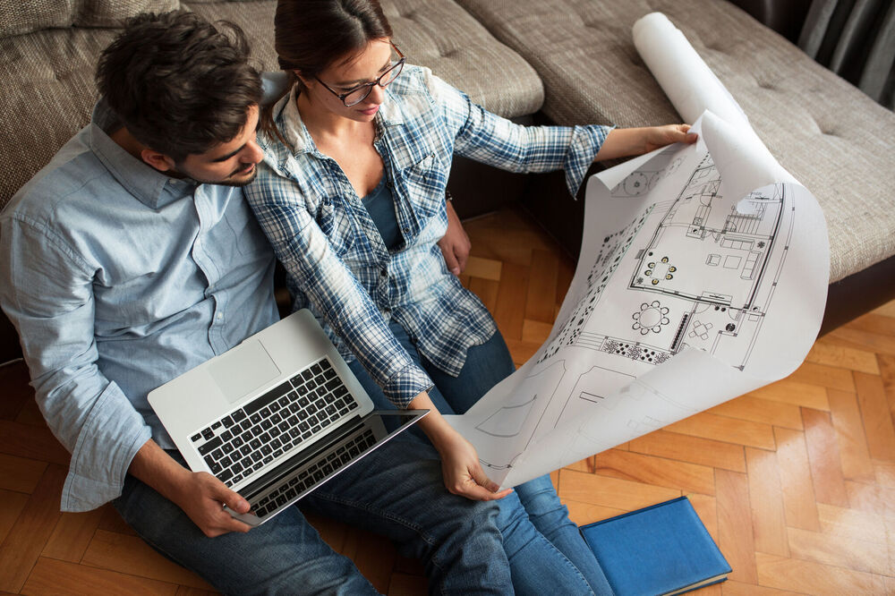 Couple looking at property details