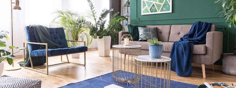 Styled living room in gold and green