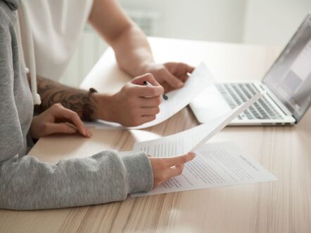 Couple with paperwork